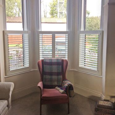 Bay window cafe style shutters