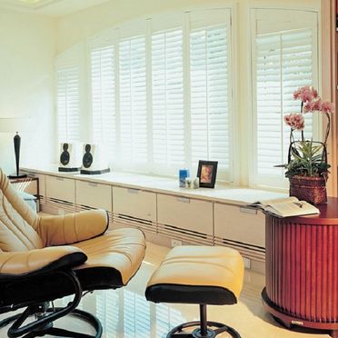 Arched_white_shutters