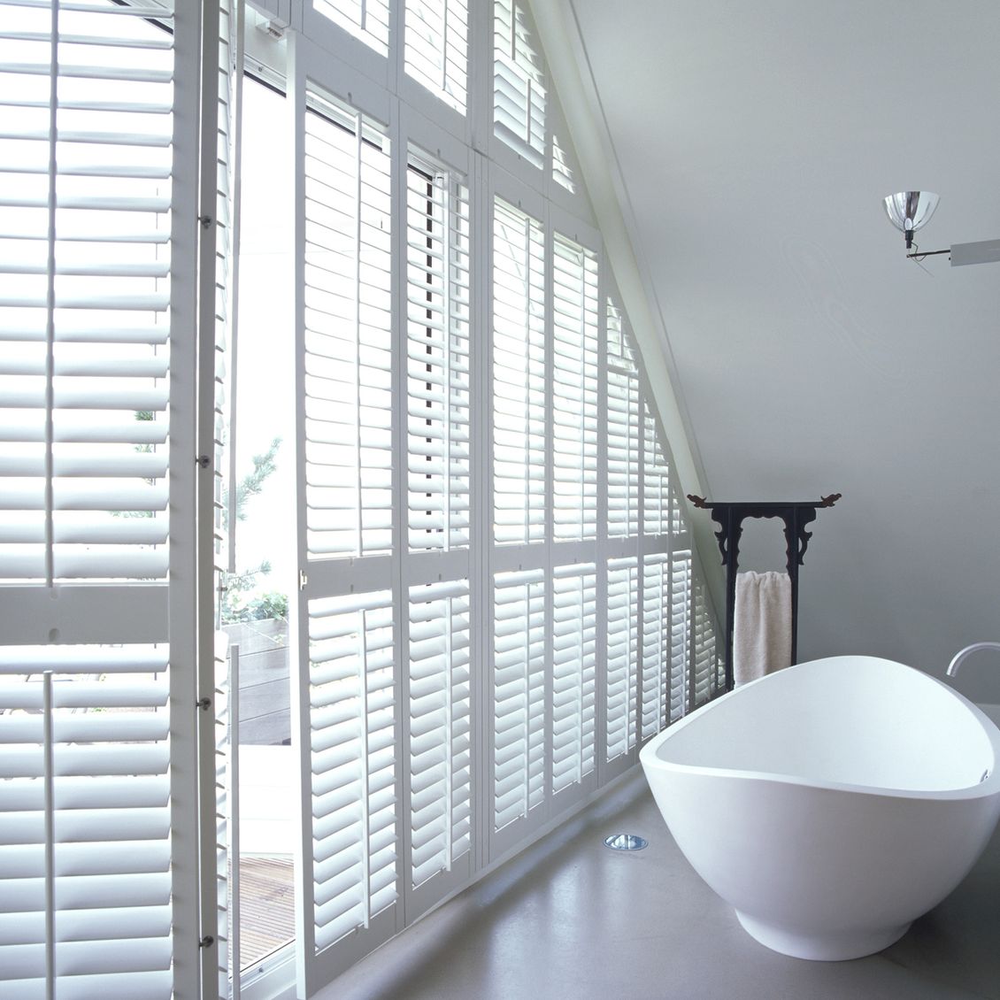 Bathroom_triangular_white_shutters