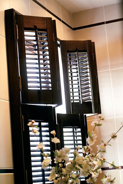 Tall_dark_wooden_shutters