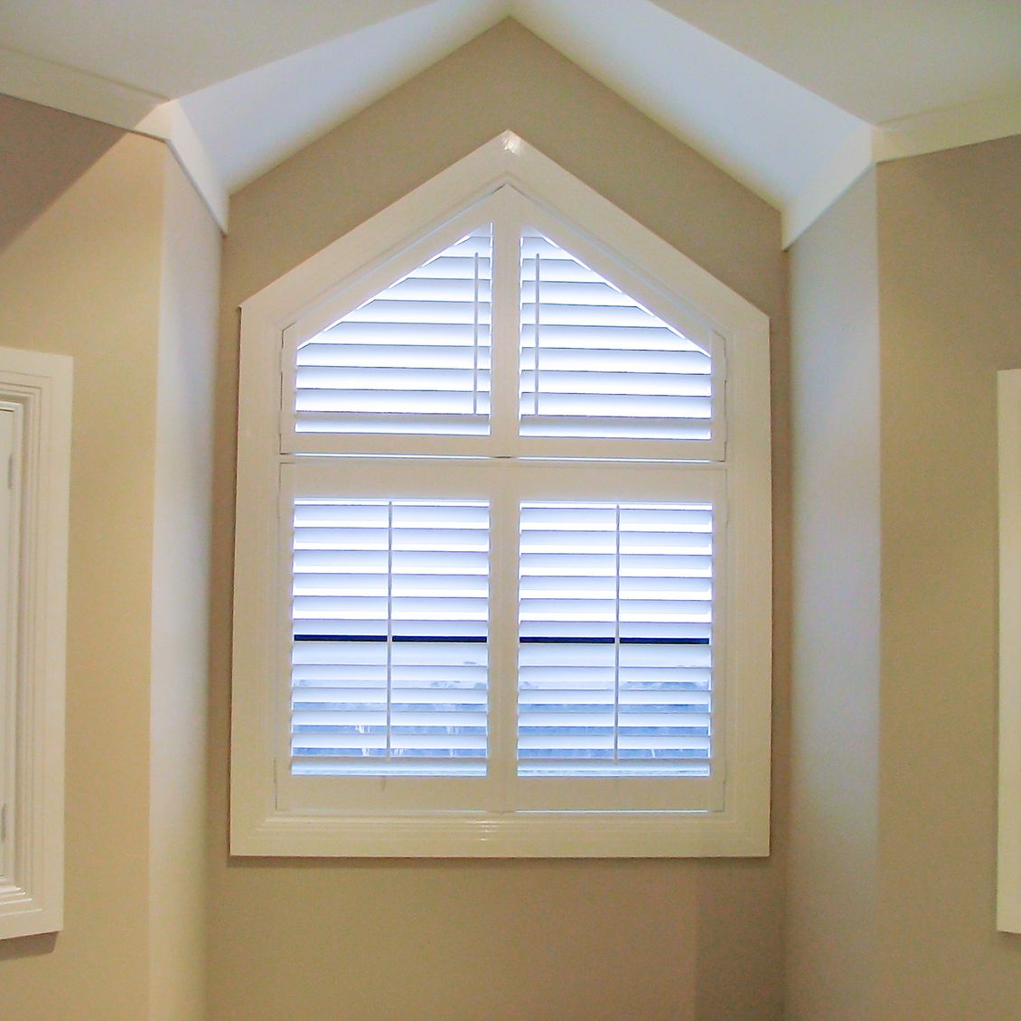 Triangular_white_shutters